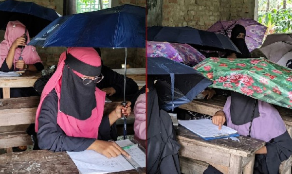 পটুয়াখালীতে বৃষ্টিতে ছাতা মাথায় দিয়ে পরীক্ষা দিলেন শিক্ষার্থীরা